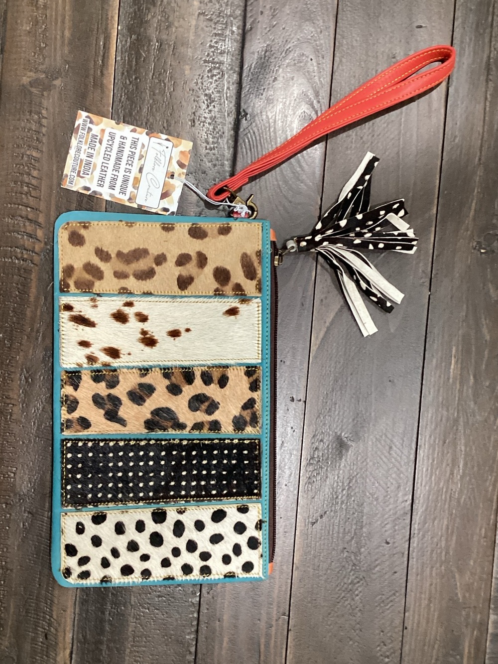 Blue and leopard print wristlet.